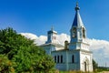 Beautiful Christian church among greenery against the sky Royalty Free Stock Photo