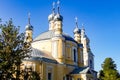 Beautiful Christian church among greenery against the sky Royalty Free Stock Photo