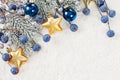 Beautiful Christmas background with glitter baubles, green Xmas tree twig and New Year decoration Royalty Free Stock Photo