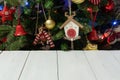 Beautiful Christmas background with ornate Christmas tree and white wooden boards, copy space