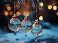 Beautiful Christmas balls hanging on the tree in the winter forest.