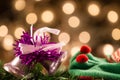 Beautiful Christmas bell in the background defocused yellow lights. Royalty Free Stock Photo