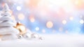 Beautiful Christmas decoration with colorful baubles and snowy fir tree against a backdrop Royalty Free Stock Photo