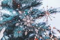 Beautiful Christmas decorations in the shape of a large white Christmas star hanging on a Christmas tree. Home decoration for Royalty Free Stock Photo