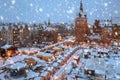 Beautiful Christmas fair in the old town of Gdansk at snowy dawn, Poland