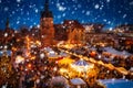 Beautiful Christmas fair in the old town of Gdansk at snowy night, Poland