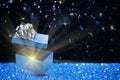 Beautiful Christmas gift box with magic light Royalty Free Stock Photo