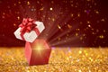 Beautiful Christmas gift box with magic light Royalty Free Stock Photo