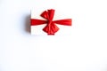 Beautiful Christmas gift box with red ribbon on isolated background. Happy New Year and merry christmas Royalty Free Stock Photo