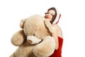 Beautiful christmas girl hugging big toy isolated white background Royalty Free Stock Photo