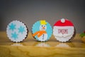 Beautiful christmas holiday santa claus snowman muffins Royalty Free Stock Photo