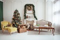 Beautiful Christmas interior. New year decoration. Living room with fireplace Royalty Free Stock Photo