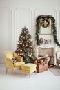 Beautiful Christmas interior. New year decoration. Living room with fireplace Royalty Free Stock Photo