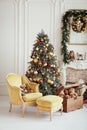 Beautiful Christmas interior. New year decoration. Living room with fireplace Royalty Free Stock Photo