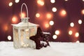 Beautiful christmas lamp on the red background with bokeh effect