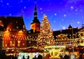 Beautiful Christmas marketplace In Tallinn old town square panorama , full moon on night sky , tree light decoration , new year