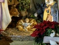 Beautiful Christmas nativity scene with holy family in a handmade wooden old stable, Italian traditional Presepio or Presepe