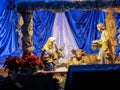 Beautiful Christmas nativity scene with holy family in a handmade wooden old stable, Italian traditional Presepio or Presepe