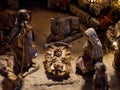 Beautiful Christmas nativity scene with holy family in a handmade wooden old stable, Italian traditional Presepio or Presepe Royalty Free Stock Photo