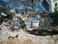 Beautiful Christmas nativity scene with holy family in a handmade wooden old stable, Italian traditional Presepio or Presepe