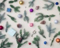 Beautiful Christmas new year decoration scene with tree, baubles, pinecone, bell, silver and red gift box Royalty Free Stock Photo