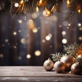 Beautiful Christmas space with ornaments and branches of conifer tree laid on wooden board