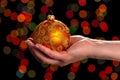 Beautiful Christmas toy-ball with golden ornaments