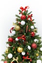 Beautiful christmas tree with colorful ornaments isolated on a w Royalty Free Stock Photo