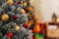 Beautiful Christmas tree decorated with balls against blurred festive lights. Space for text Royalty Free Stock Photo