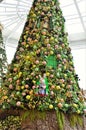 Christmas tree decorated with colorful polka dots, lights and rabbits