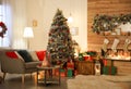 Beautiful Christmas tree in living room. Festive interior