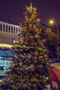 Beautiful Christmas tree outdoors, vertical picture Royalty Free Stock Photo