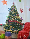Beautiful Christmas tree with presents around it Royalty Free Stock Photo