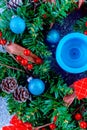 Beautiful Christmas wreath,blue candle,berries