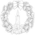 A beautiful Christmas wreath decorated with cones, berries, bows and burning bright candle.