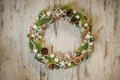 beautiful Christmas wreath decorated with various natural and artificial materials. Top view