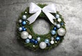 Beautiful Christmas wreath on grey background, top view Royalty Free Stock Photo