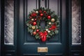 Beautiful Christmas wreath hanging on entrance door. Typical Christmas wreath with green fir tree branches, golden and Royalty Free Stock Photo