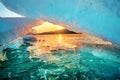 Beautiful chunk of Ice at Sunrise in winter. Royalty Free Stock Photo