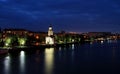 Beautiful church with illuminating at night, lights reflected in the water. View of the Dnipropetrovsk Embankment , Ukraine