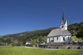 Beautiful church in a mountain landscape on a sunny day in austria Royalty Free Stock Photo