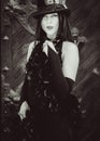 Gothic lady in a luxurious glamorous retro look for Halloween Royalty Free Stock Photo