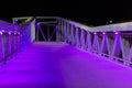 Beautiful city bridge with purple and blue lights modern city architecture in scheveningen the netherlands urban city scenery Royalty Free Stock Photo