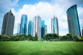 Beautiful city greenbelt with modern buildings Royalty Free Stock Photo