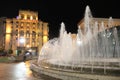 Beautiful city of Kyiv at night. Jets of water in city fountains