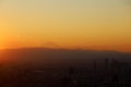 Beautiful city landscape looking view Fuji from Tokyo city in the sunrise.