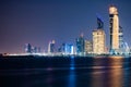 Beautiful City night view of Abu Dhabi financial and commercial district, taken during blue hour, view from marina backwater, Royalty Free Stock Photo