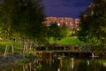 Beautiful city park on the outskirts of the city. View at night, with backlight, long exposure. Royalty Free Stock Photo