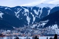 Winter panorama of Zell Am See city with ski slopes and mountains covered in snow. Famous ski resort in Austria, Europe. Royalty Free Stock Photo