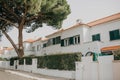 Beautiful city view of a cozy street with trees and houses in Lisbon in Portugal Royalty Free Stock Photo